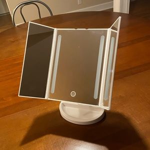Trifold white makeup mirror